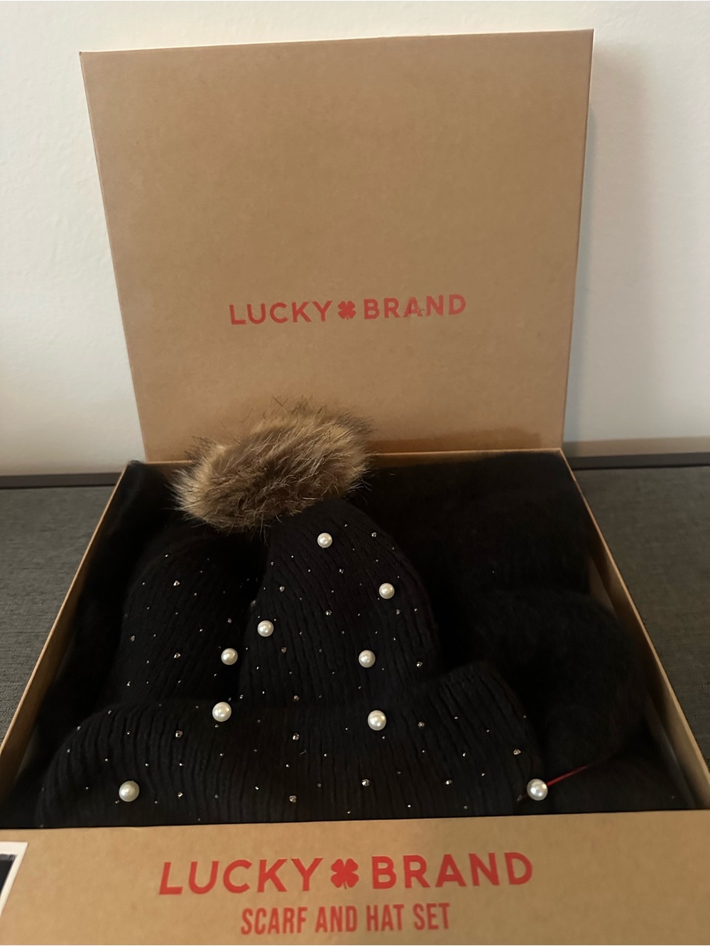 Lucky Brand Black Beanie with Faux Fur Pom and Pearl Accents and black scarf set